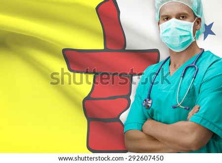 Surgeon with Canadian province flag on background - Nunavut