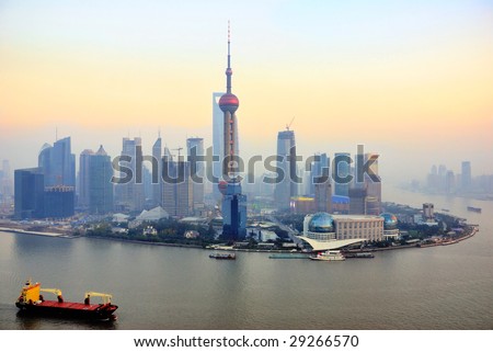 China Shanghai  the pearl tower and Pudong skyline at sunset.