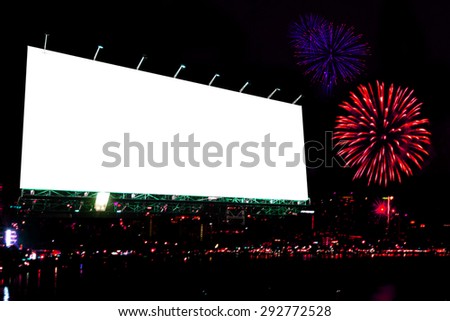 blank billboard at night with fireworks