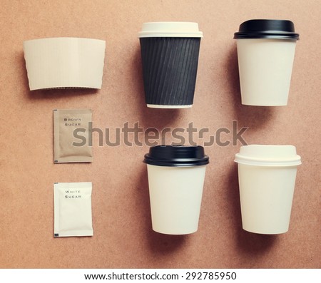 Coffee cup mock up for identity branding from top view with retro filter effect Royalty-Free Stock Photo #292785950