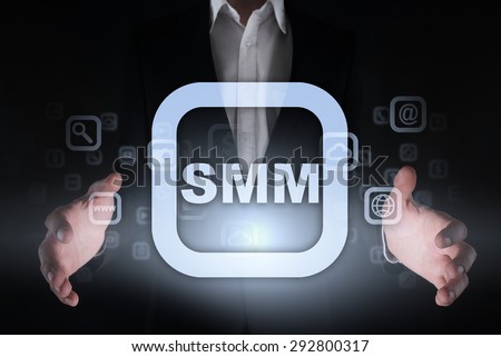"SMM" Icon in the hands of the businessman. Business concept. Internet concept. 