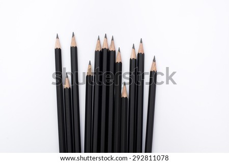 black pencil on white background