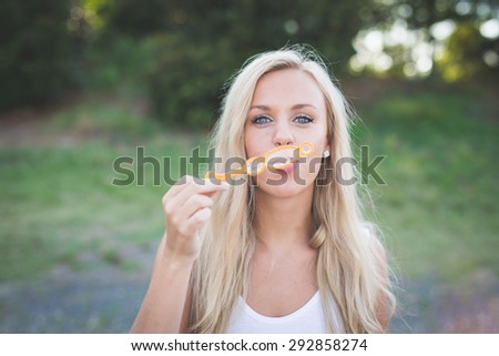 Beautiful Blonde woman outdoors