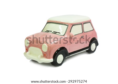 Pink Ceramic Car On White Background Isolation