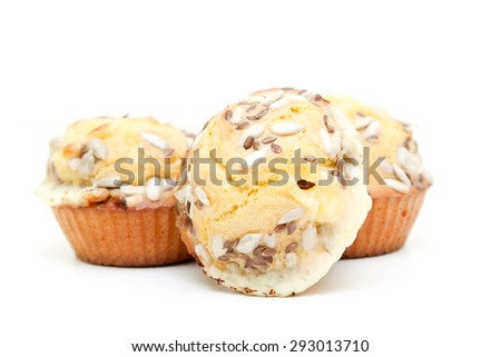 Muffins with cheese and seeds  isolated on a white background
