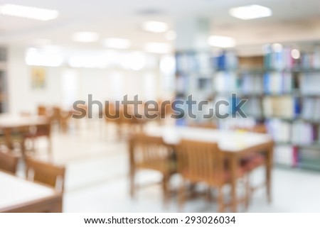 library with table desk and bookshelf, abstract blur defocused background