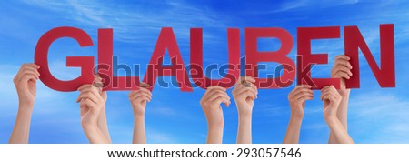 Many Caucasian People And Hands Holding Red Straight Letters Or Characters Building The German Word Glauben Which Means Believe On Blue Sky