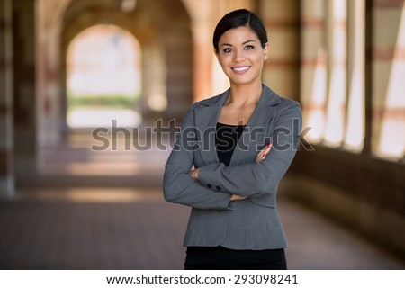 Confident successful smiling business woman executive with folded arms  Royalty-Free Stock Photo #293098241