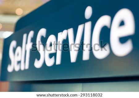 close up of self service sign at airport Royalty-Free Stock Photo #293118032