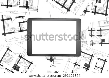 digital tablet computer and graphic sketches of new house