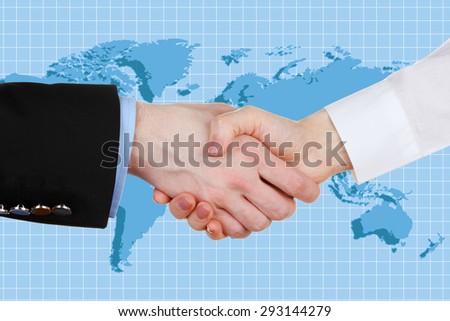 Business handshake on world map background