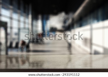 blurred background of gray color and black desk space 