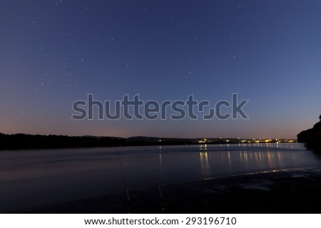 Beautiful night sky with constellation over Danube river. Scorpius, Sagittarius, Scutum, Aguila, Sagitta, Serpens, Libra, Ophiuchus, Virgo, Corvus. . Stars Antares,Shaula, Spica, Planet Saturn
