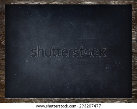 Blackboard / chalkboard texture. Empty blank black chalkboard with chalk traces