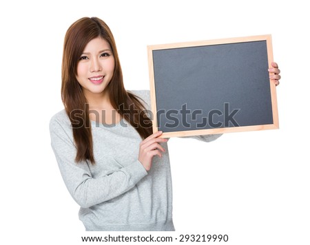 Asian woman showing the chalkboard for design