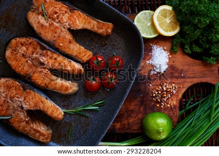 Very simple and tasty dishes on a grill pan fried salmon drizzled with lemon or lime to make it more vivid taste. To decorate your dishes, you can use onions and tomatoes