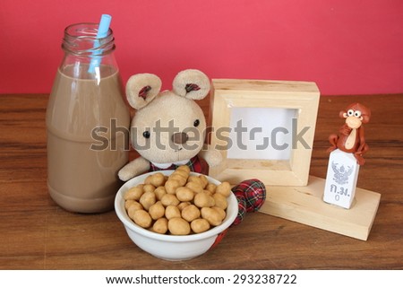 peanuts coconut cream coated,peanuts,plant,chocolate milk,photo frame