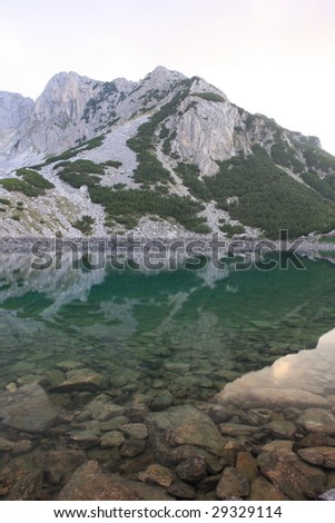 the clear mountain lake and reflection
