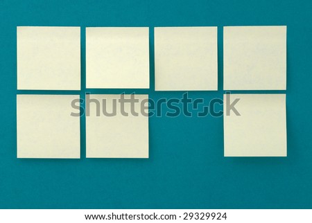 Yellow stickers on old  green paper background