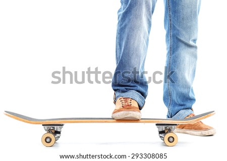 Feeling extreme. Portrait of young man using stake board on white isolated background. 