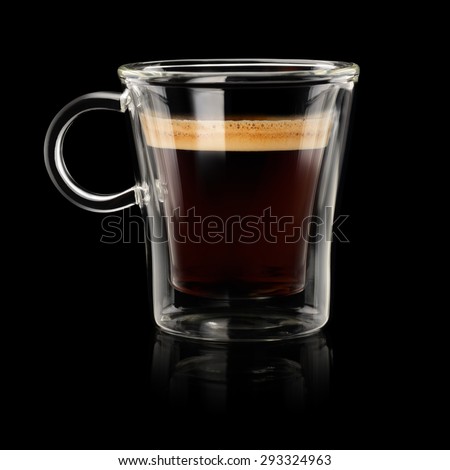 Coffee espresso doppio or lungo in transparent cup on black background Royalty-Free Stock Photo #293324963