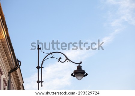Towers and architectural parts with blue sky and white clouds in Sibiu, Romania