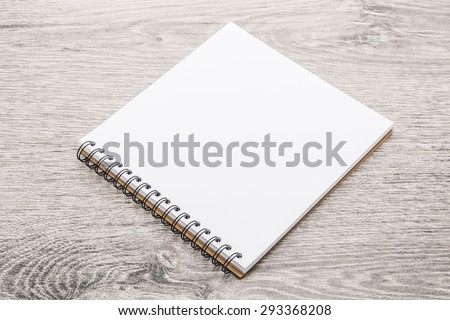 White paper mock up on wood background