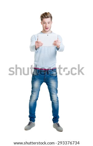 Teenage student holding a tablet computer isolated on white