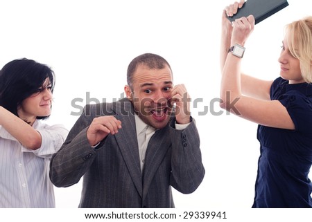 Angry business women fighting with a colleague