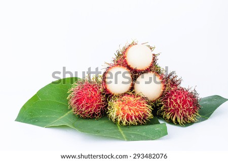 Thailand red rambutan fruit is sweet on a white background.
