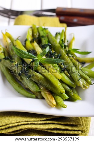 Minted green bean appetizer in square plate