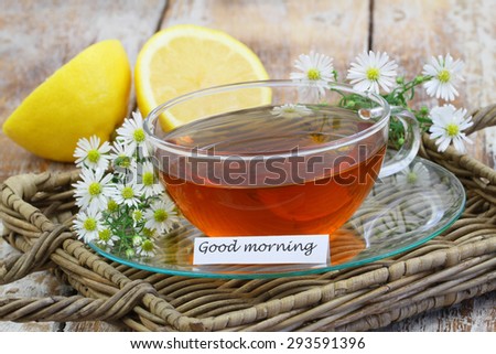 Good morning card with chamomile tea on wicker tray
