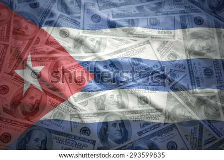 colorful waving cuban flag on a american dollar money background