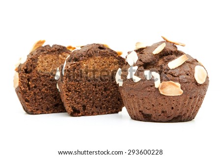Chocolate muffins with a nut stuffing isolated on a white background