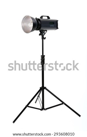 studio flash on a stand with isolated background