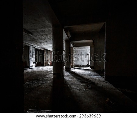 Dark industrial interior of an old building