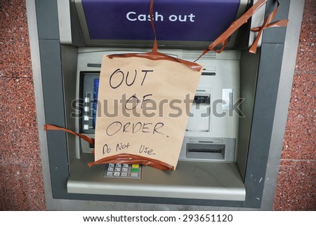 View of an Out of Order Automated Teller Machine or ATM - Bankruptcy, Credit Crunch, Financial Crisis and Failed Business Themed Image Royalty-Free Stock Photo #293651120