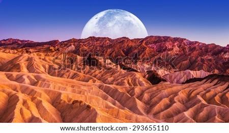 Death Valley Scenic Night. Death Valley National Park Badlands Sandstones Landscape and the Moon. California, United States.