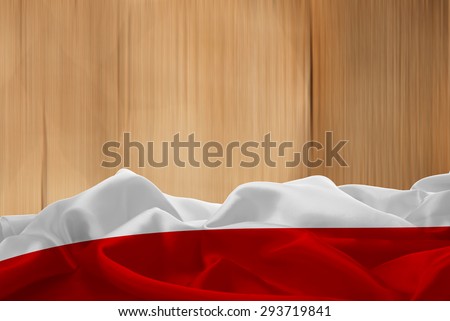 Poland flag and wood background