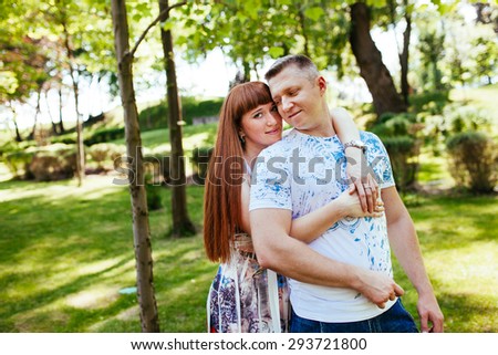 Beautiful Pregnant couple in the park