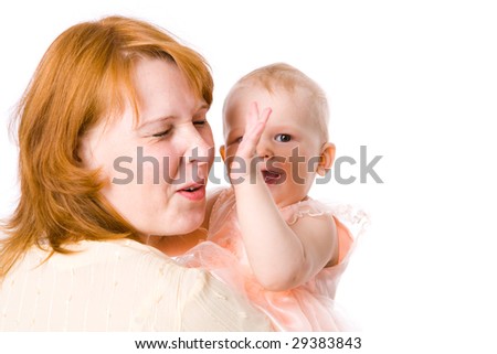 Baby playing with mother isolated on white