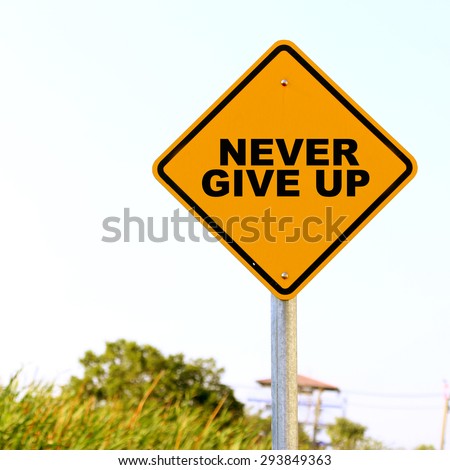 Never Give Up on traffic sign
