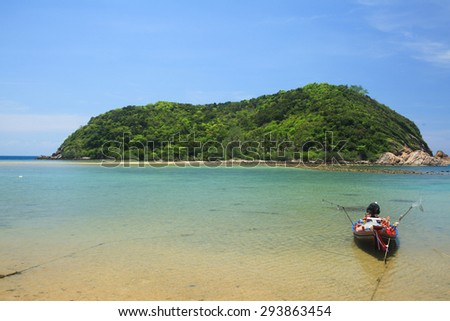 Kayaking boat and the island behind.