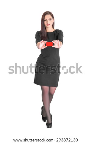 young smiling business woman holding credit card isolated on white background