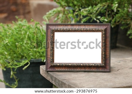 Antique wooden frame with the wooden floor on Nature Backgrounds.
