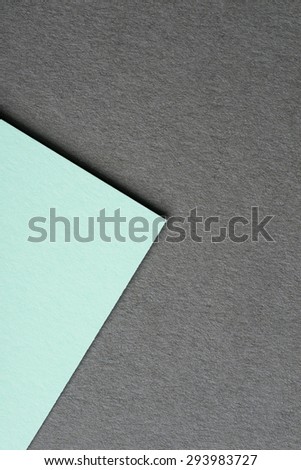 Mint color paper sheet on grey background