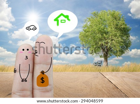 Couple Finger holding money on wood floor and nature background , family concept