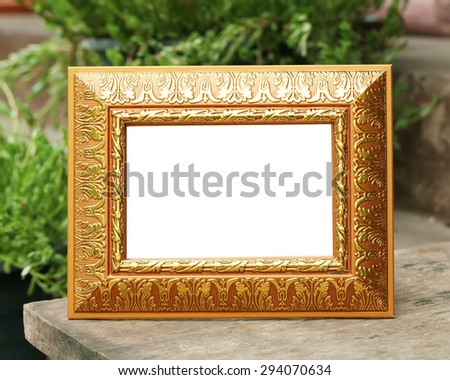 Gold vintage frame on Natural background.