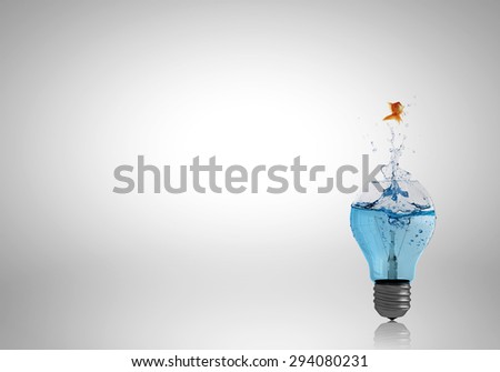 Conceptual image with light bulb filled with clear water Royalty-Free Stock Photo #294080231