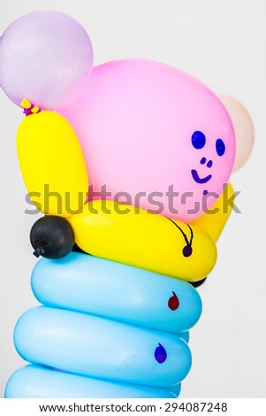 Colorful balloons with different shapes.